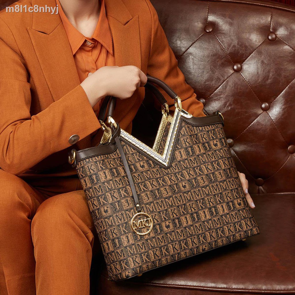 Túi nữ MKJ 2021 da thời trang mới xách công suất lớn phù hợp đeo một vai