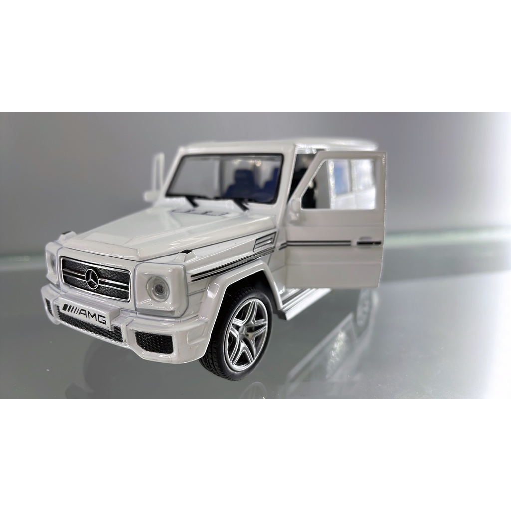 Mô hình xe Mercedes-Benz AMG G63 tỉ lệ 1:32 khung kim loại, 3 màu Đen, Đỏ, Trắng Có Đèn Và Nhạc