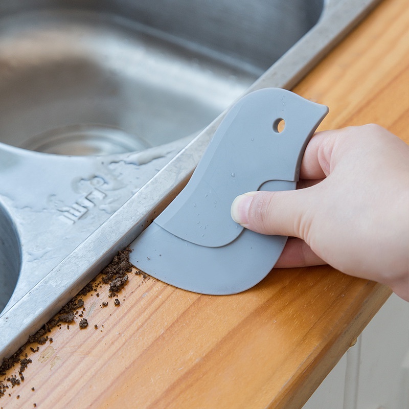 Dụng cụ gạt dầu hình chim cánh cụt sáng tạo
