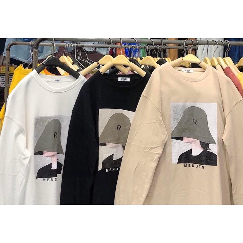 Áo phông dài tay cô gái đội mũ