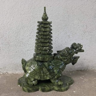 Long Quy cõng tháp văn xương đá nguyên khối