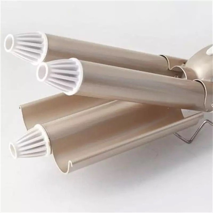Máy uốn tóc gợn sóng làm xoăn tóc 3 trục KEMEI KM 1010 có 2 mức chỉnh nhiệt