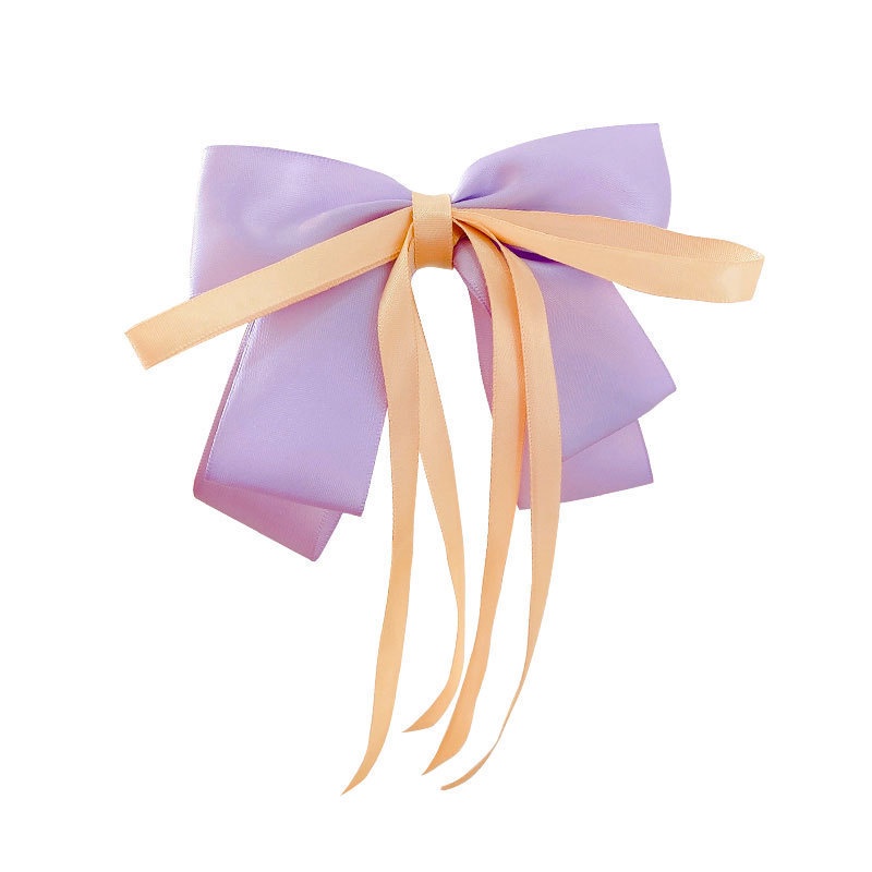 Kẹp tóc nơ nữ tính đơn giản và dễ thương