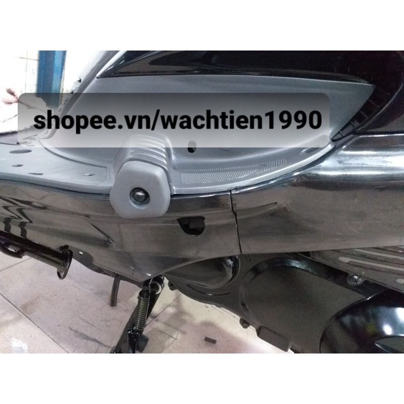 Chụp gác chân xe spacy 125