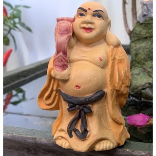 Tượng gốm Phật Di Lạc đứng gốm sứ.
