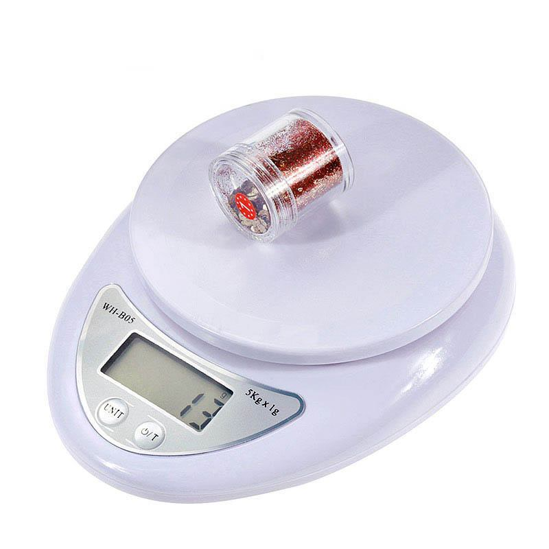 Cân điện tử mini đa năng tiện dụng sử dụng trong nhà bếp