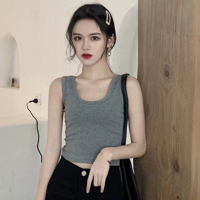 Mùa hè đơn giản màu trơn quần lửng nữ sinh mặc thể thao phiên bản Hàn Quốc để lộ rốn và mặc một chiếc áo vest nhỏ