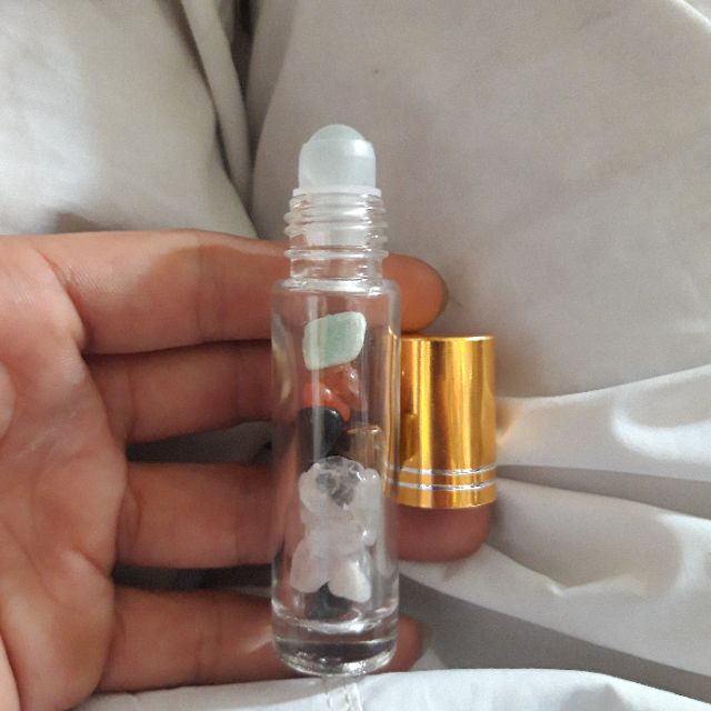 10ml chai bi lăn có dá quí bên trong ,lọ dùng để chiết nước hoa chứa chất lỏng