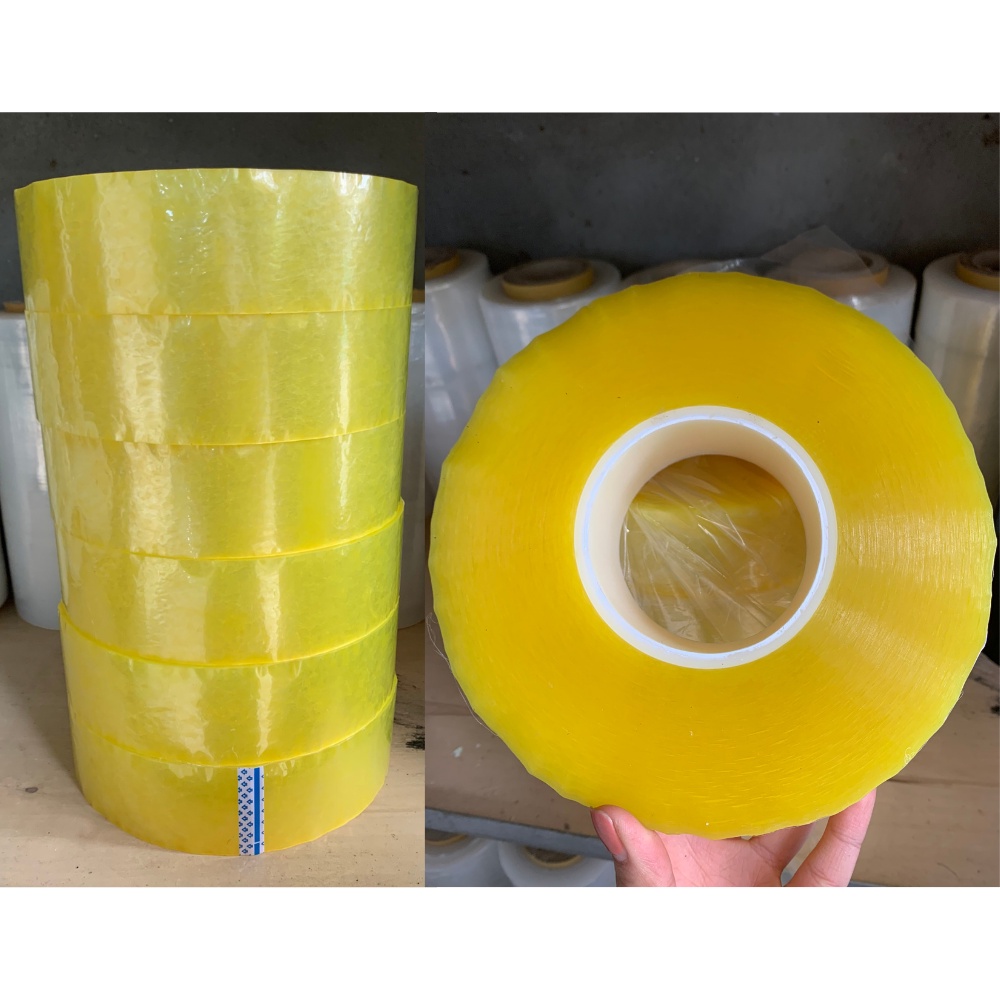 Cuộn băng keo đóng gói hàng, băng dính dán , băng keo lõi siêu mỏng nhẹ 1kg màu vàng đục