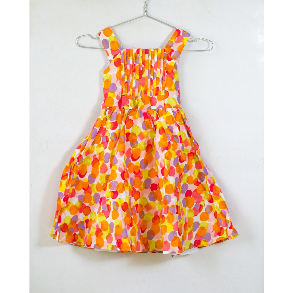 Váy bé gái chấm tròn màu sắc sặc sỡ cam vàng đỏ 5-6 tuổi