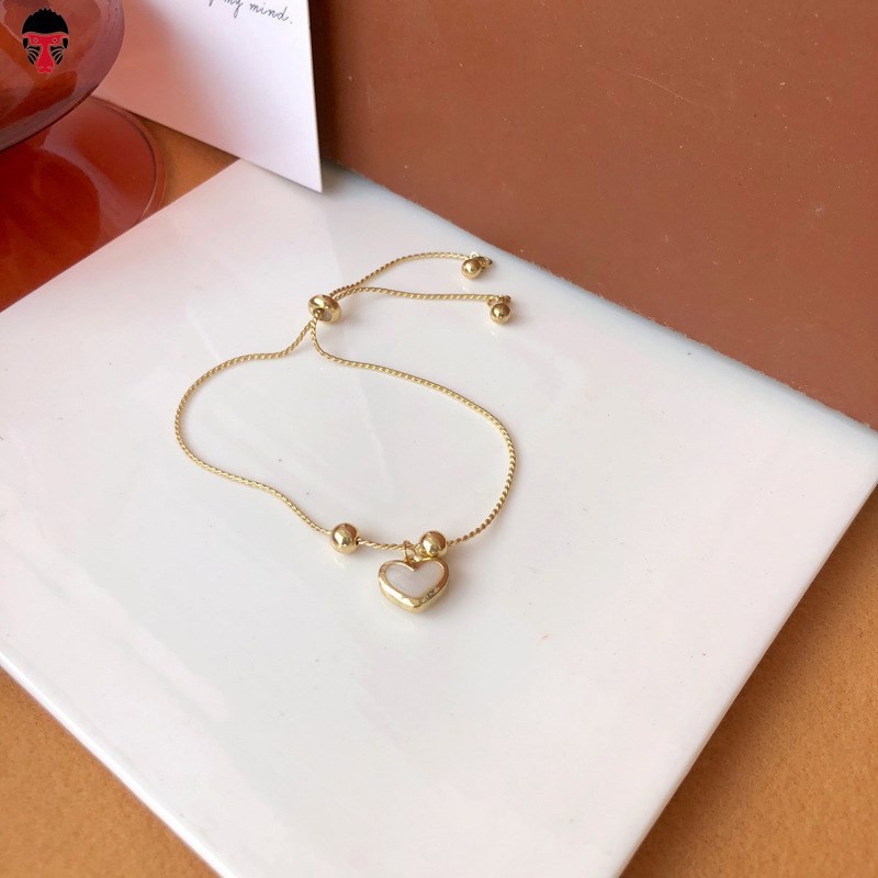 LT002 Lắc tay, Vòng tay titan hợp kim cao cấp màu vàng Gold trái tim dây rút (có thể điều chỉnh size) Malisa Accessories