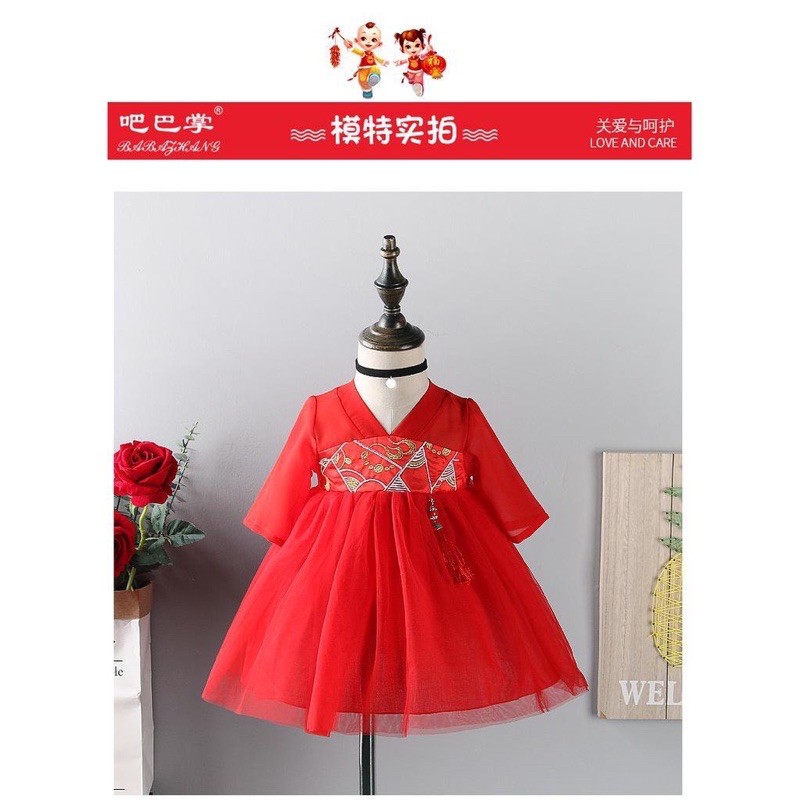 váy gấm đỏ bé gái