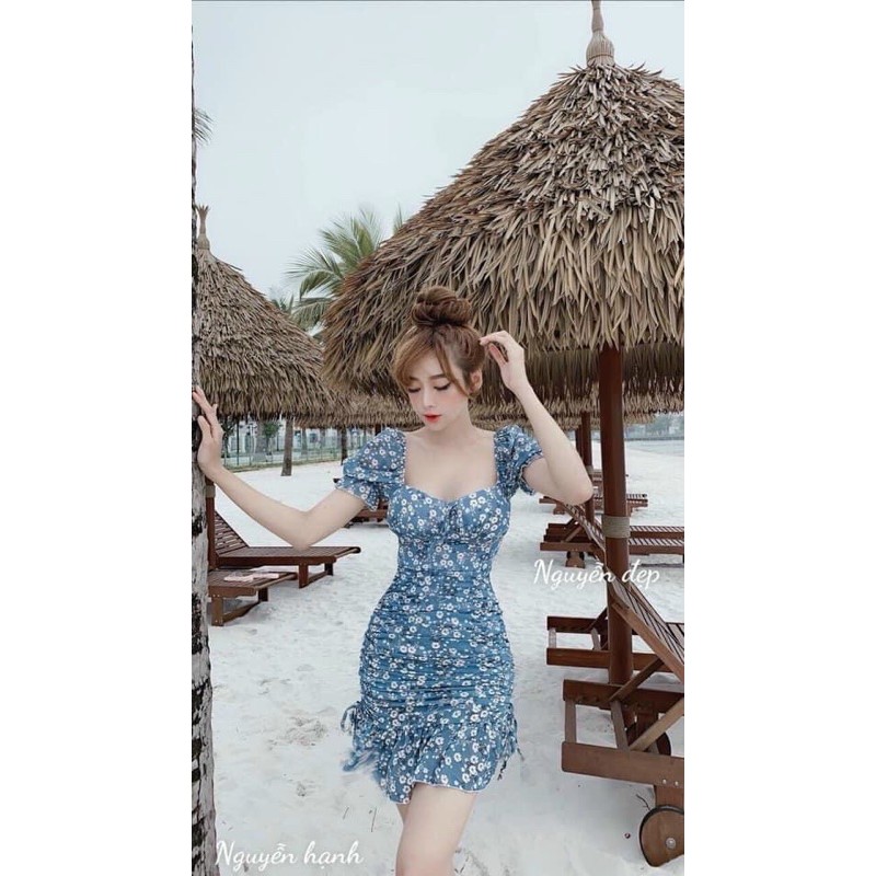 Đầm body hoạ tiết hoa nhí phối dây nơ hai bên, có kèm mút ngực