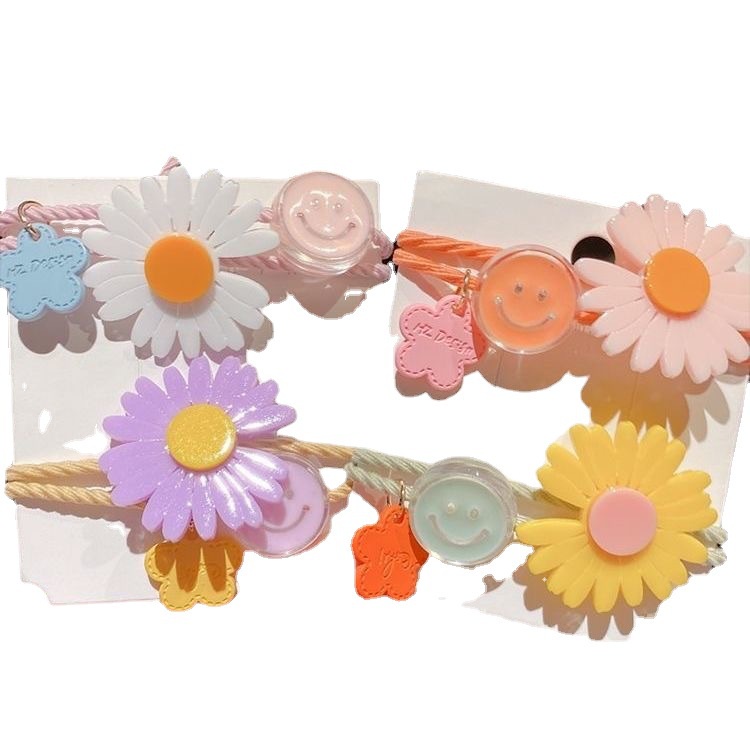 Dây thun buộc tóc đính hoa hướng dương nhỏ cho bé gái