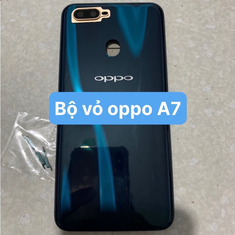 Bộ vỏ oppo A7 - ( gồm lưng , sườn , phím , kính camera )