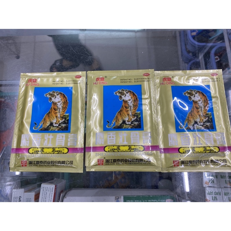 Cao dán cọp . cọp ngồi