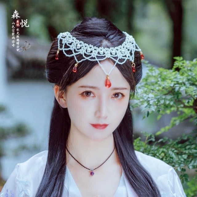 Vòng tay dây tết đỏ charm sen