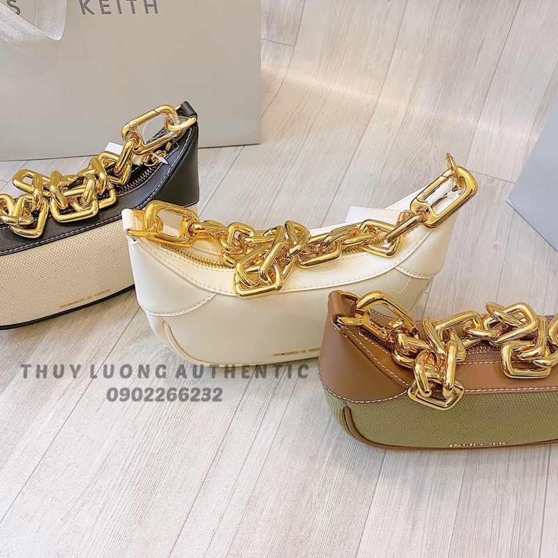 Túi xách Charles and Keith màu xanh lá, kem, kem đen