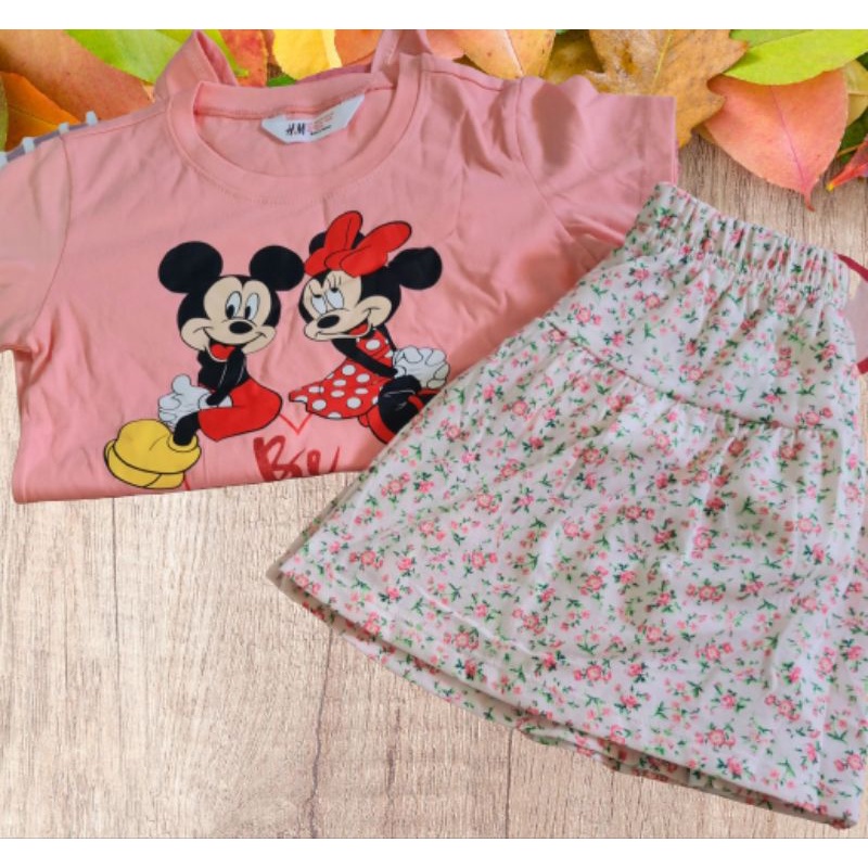Đồ bộ bé gái màu cam nhạt áo kèm chân váy với chíp đùi bên trong size 18-45kg