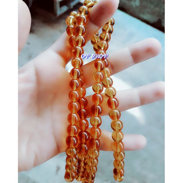 Hạt đá vàng 8mm ( 1 xâu 40v )