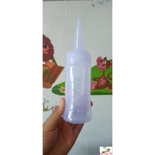Bình tra dung dịch uốn lạnh dùng dể làm tóc