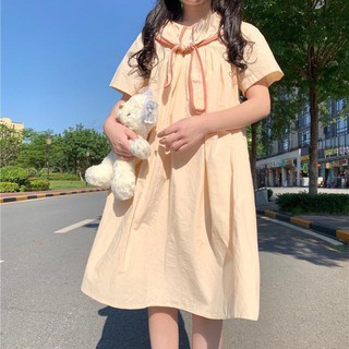 Váy baby doll cột nơ tay ngắn dáng xoè dài
