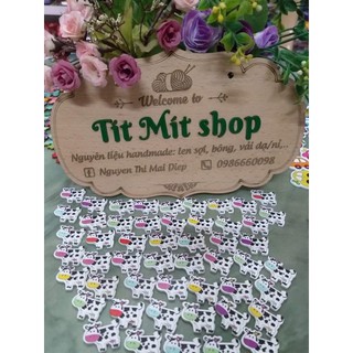 Set cúc gỗ hình con bò