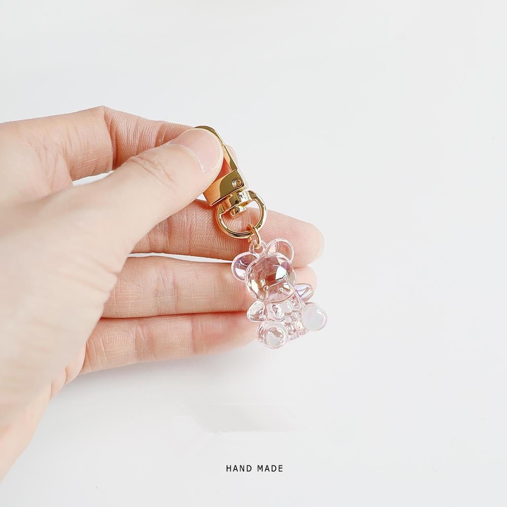 Móc Khóa Gắn Vỏ Bảo Vệ Hộp Sạc Tai Nghe Airpods Trong Suốt Hình Gấu Dễ Thương