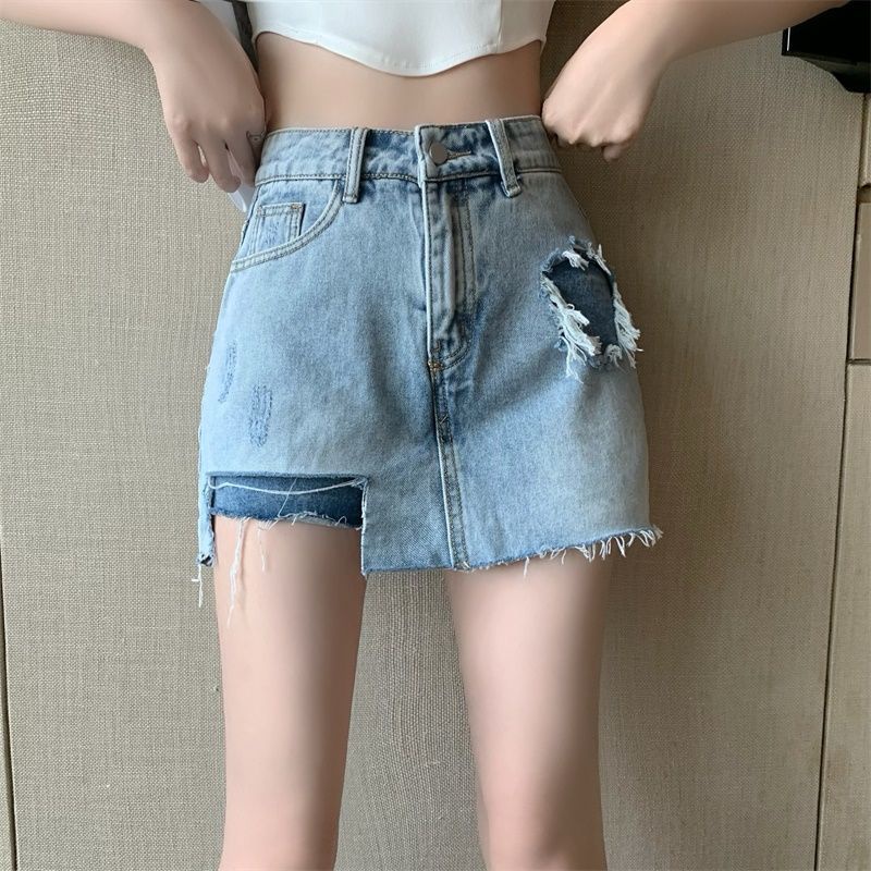 Chân váy denim siêu ngắn ngang hông cạp cao phối lỗ không đồng đều phong cách mùa hè 2022 cho nữ