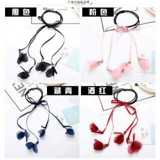 Cột tóc hoa rơi