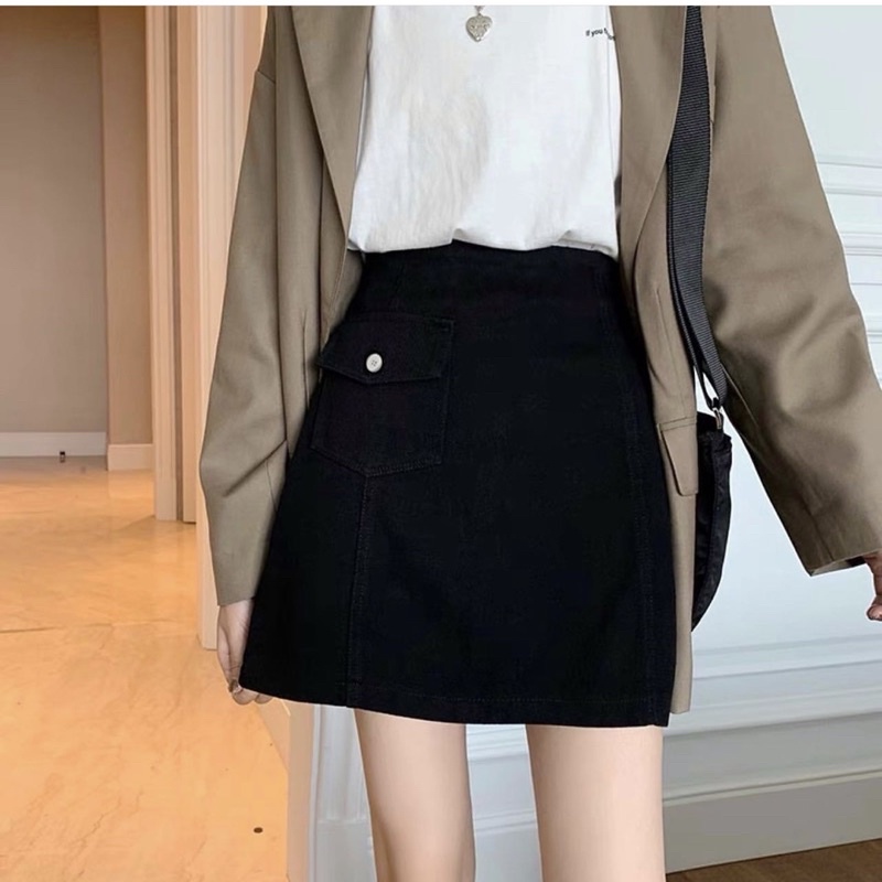 Váy quần bigsize túi nắp nút trắng