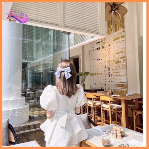 Áo babydoll cổ vuông gấm tay phồng cột nơ sau kiểu Hàn Quốc