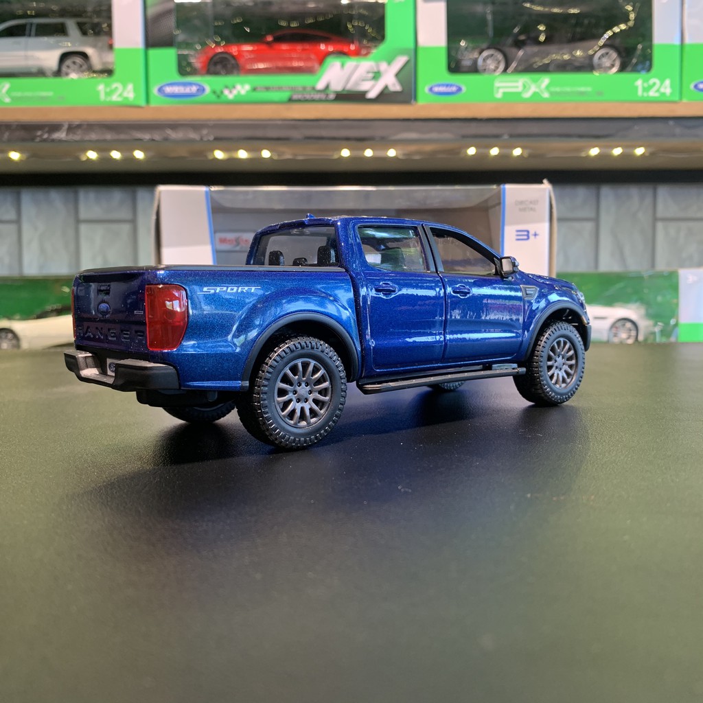 Mô hình xe bán tải Ford Ranger 2019 tỉ lệ 1:27 hãng Maisto (Cam+ Xanh)