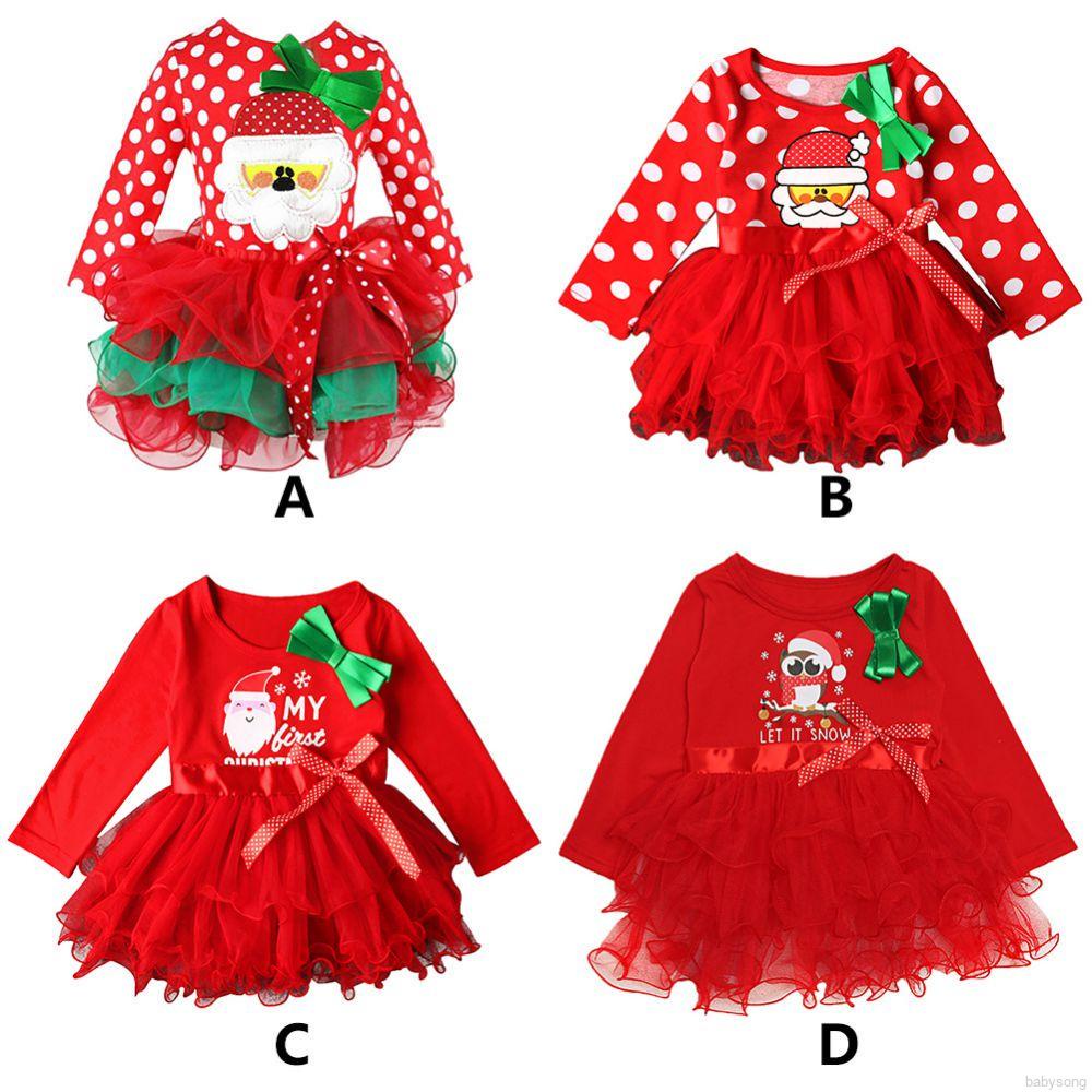 Đầm bé gái in hình ông già Noel