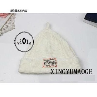 Mũ len chóp nhọn gắn tag