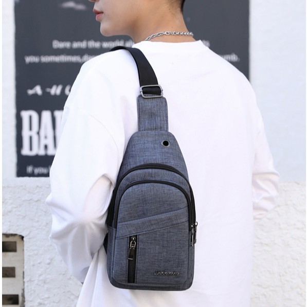 Túi đeo chéo nam vải Canvas thời trang Hàn Quốc tích hợp lỗ tai nghe TC120 | BigBuy360 - bigbuy360.vn