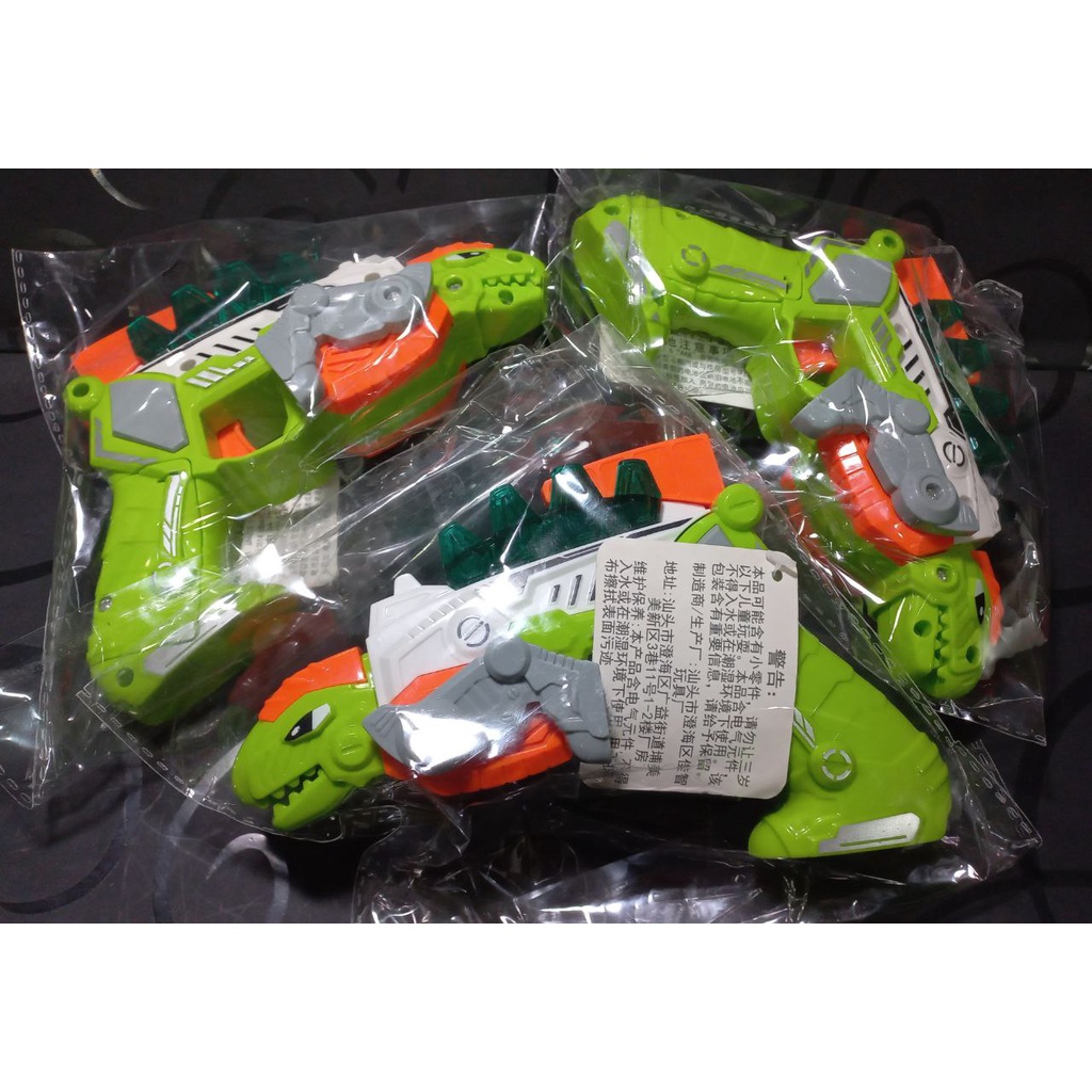 Đồ Chơi S.úng Khủng Long, Có Đèn Nhạc, Lắp Ráp Thay Đổi Hình Dáng 02133