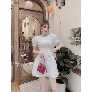 Đầm xòe gấm xốp hở lưng phối nơ sau cổ tròn tay phồng!