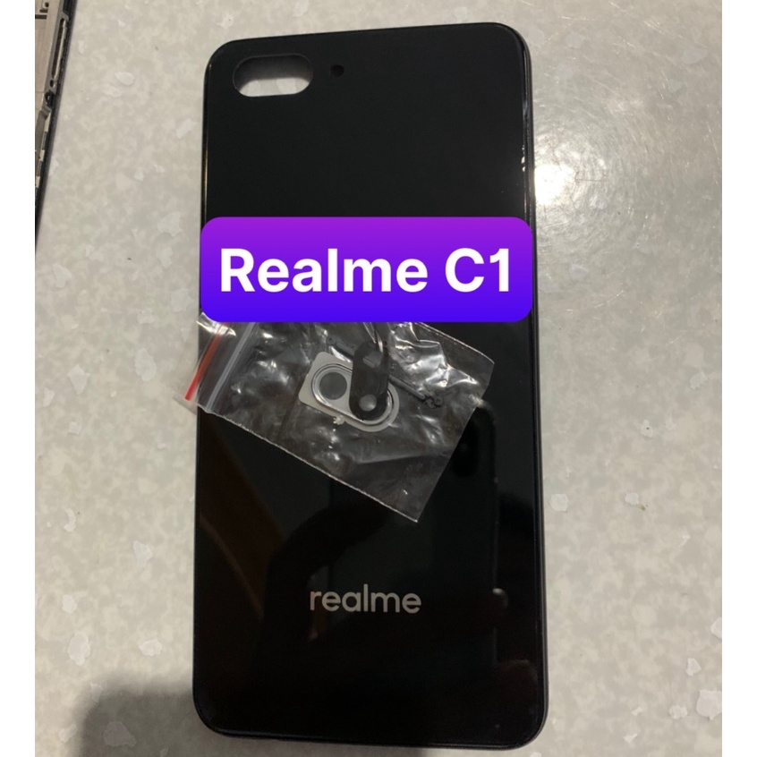 bộ vỏ Realme C1 - gồm lưng,sườn,phím,kính camera