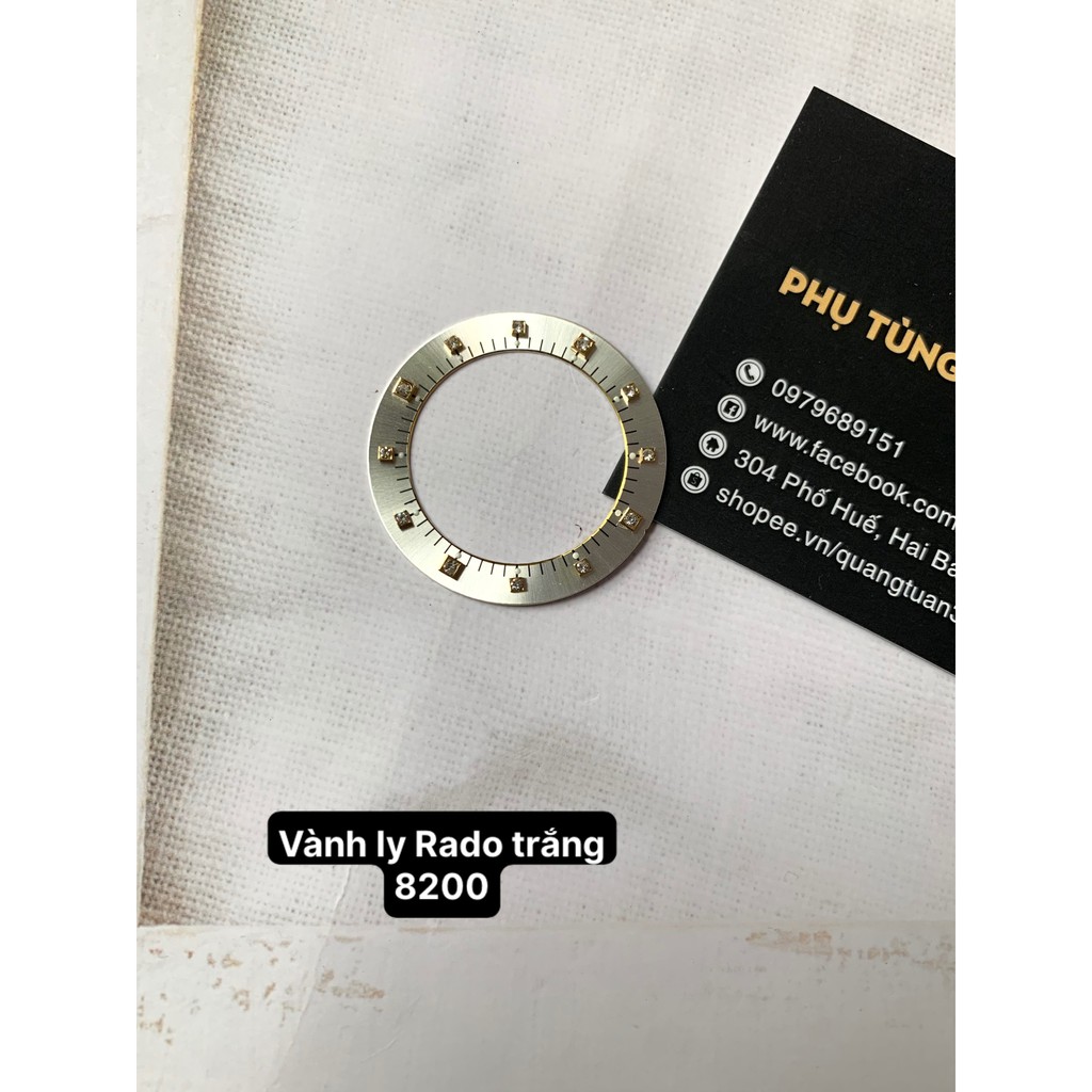 Vành ly đồng hồ Rado vàng - trắng 8200