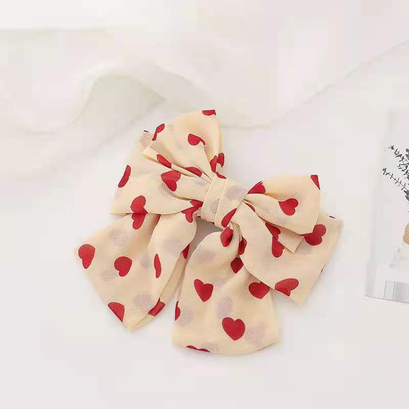 Kẹp tóc đính nơ phong cách Hàn Quốc ngọt ngào cho nữ