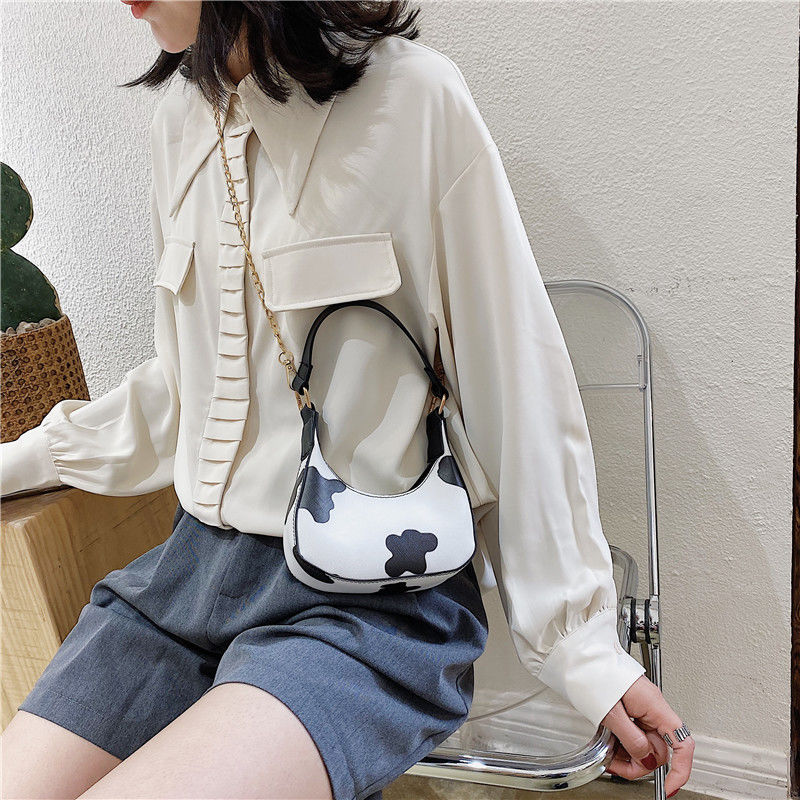 Túi xách đeo vai họa tiết da bò sữa thiết kế thời trang cho nữ | BigBuy360 - bigbuy360.vn