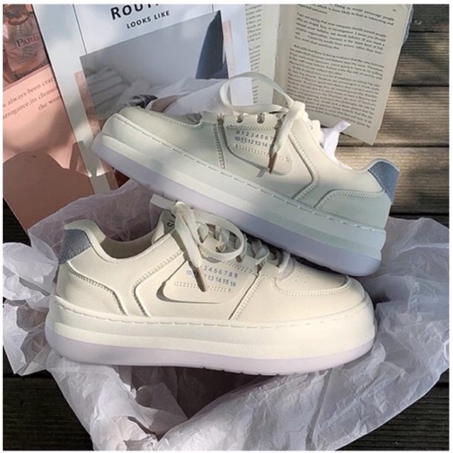 Giày thể thao nữ số 11 màu kem gót xanh đen