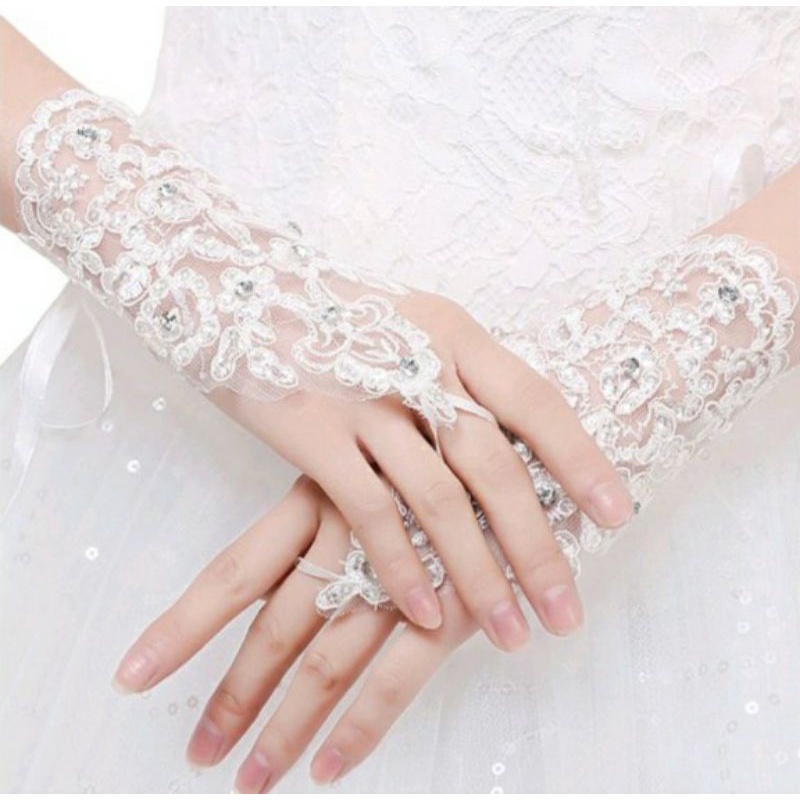 Găng tay đính hạt xỏ ngón
