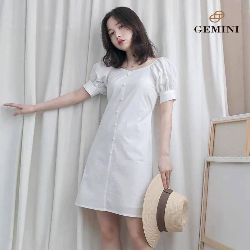 Váy trắng tay bồng thắt nơ