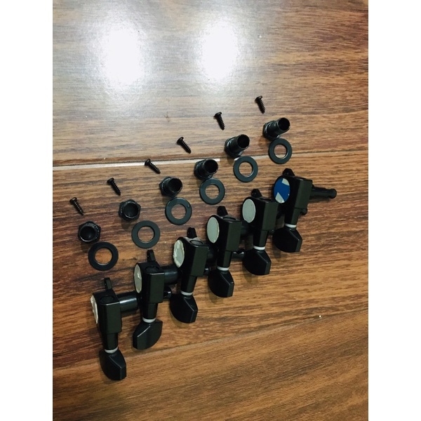 Khoá đúc cho đàn guitar điện. Khoá đàn guitar Acoustic 1 vế.