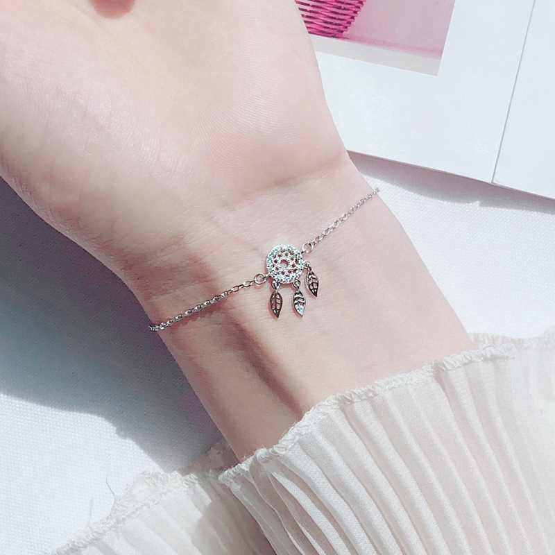 [Mã FAMAYFA giảm 10K đơn 50K] Vòng tay phối dây tua & lông vũ đính đá pha lê zircon cho nữ