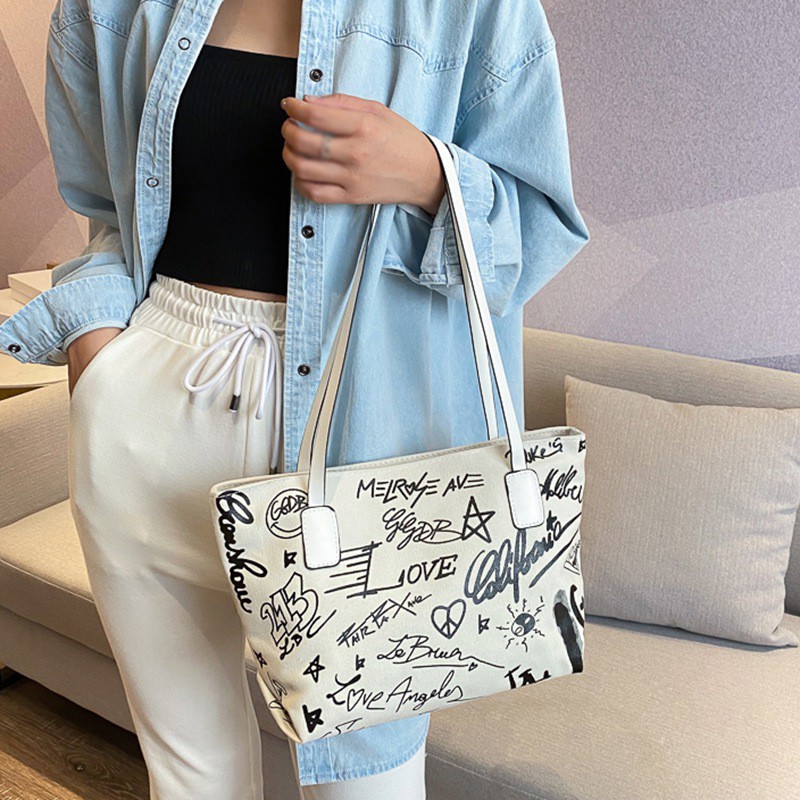 Túi Vải Canvas Đeo Vai Có Khóa Kéo Họa Tiết Graffiti Thời Trang Cho Nữ