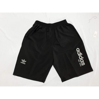 Quần gió nam cạp chun khoá túi