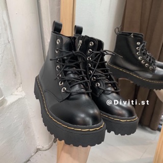 Giày boot màu đen chỉ mã 014